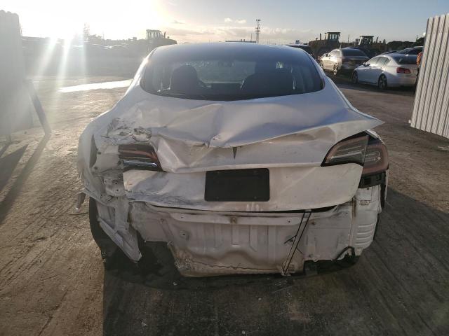 Photo 6 from auction – 2021 TESLA MODEL 3 with VIN 5YJ3E1EA2MF090409