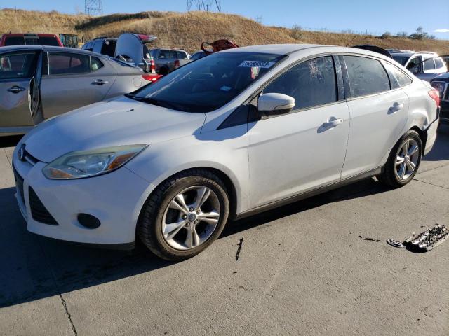 FORD FOCUS SE 2014 with VIN 1FADP3F22EL392692 - Photo from auction
