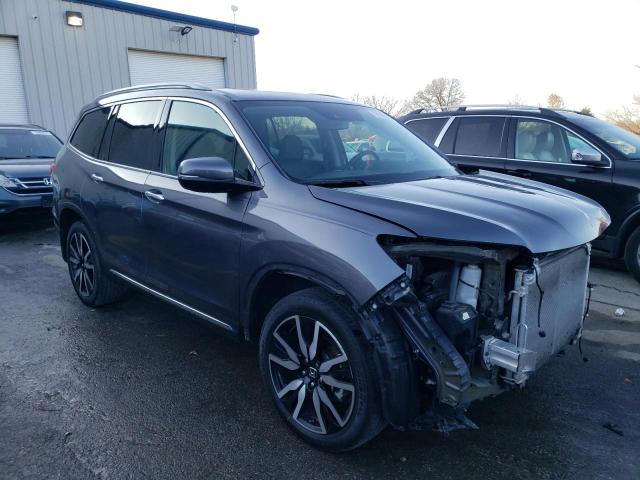 Photo 4 from auction – 2021 HONDA PILOT TOUR with VIN 5FNYF6H96MB009428