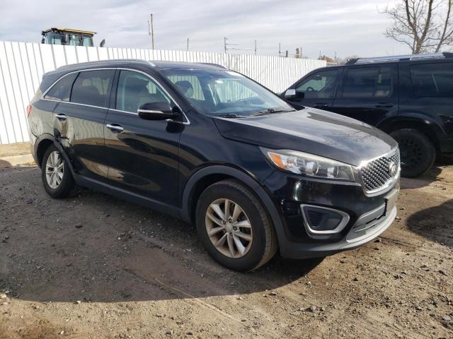 Photo 4 from auction – 2016 KIA SORENTO LX with VIN 5XYPG4A39GG077481