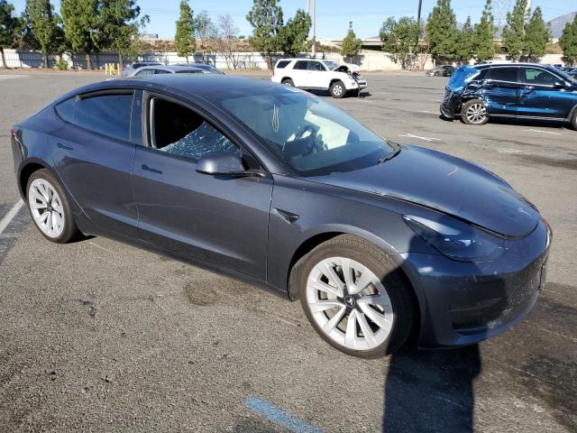 Photo 4 from auction – 2021 TESLA MODEL 3 with VIN 5YJ3E1EA3MF990722