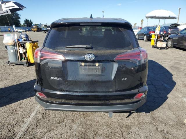 Photo 6 from auction – 2018 TOYOTA RAV4 LE with VIN 2T3ZFREVXJW444725