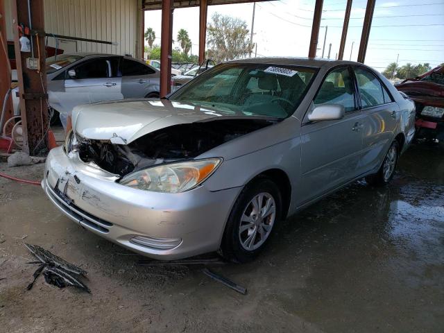 TOYOTA CAMRY LE 2004 with VIN 4T1BF32K84U571253 - Photo from auction