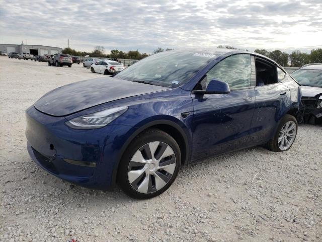 TESLA MODEL Y 2023 with VIN 7SAYGDEE6PA106233 - Photo from auction
