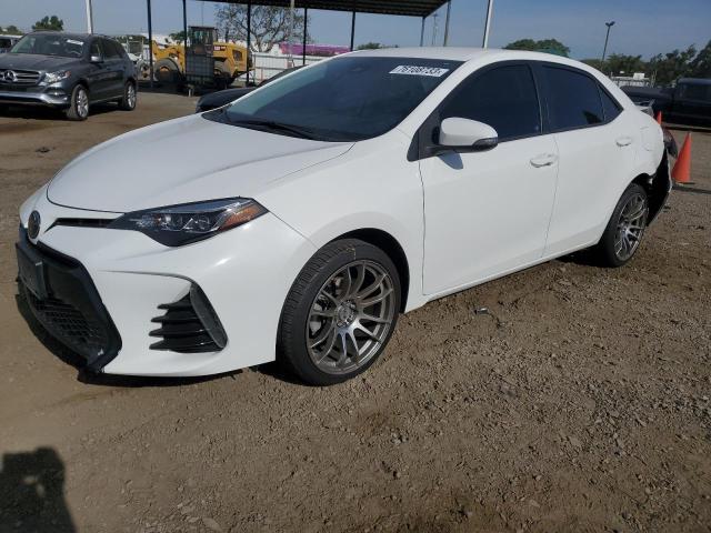 TOYOTA COROLLA L 2018 with VIN 5YFBURHE1JP743422 - Photo from auction