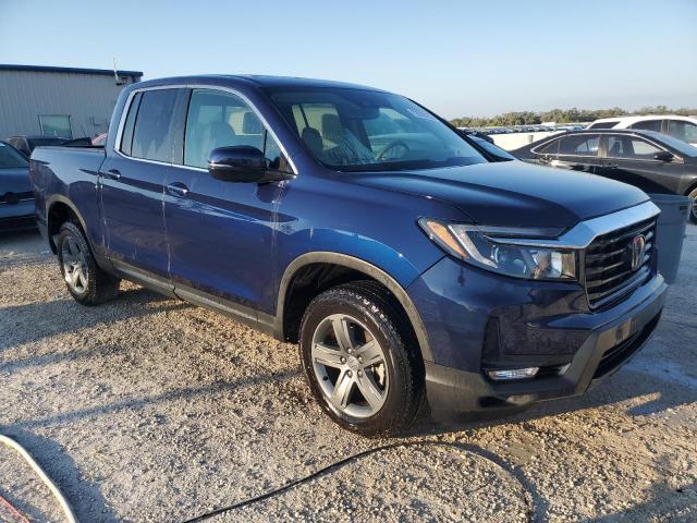Photo 4 from auction – 2023 HONDA RIDGELINE with VIN 5FPYK3F58PB008478