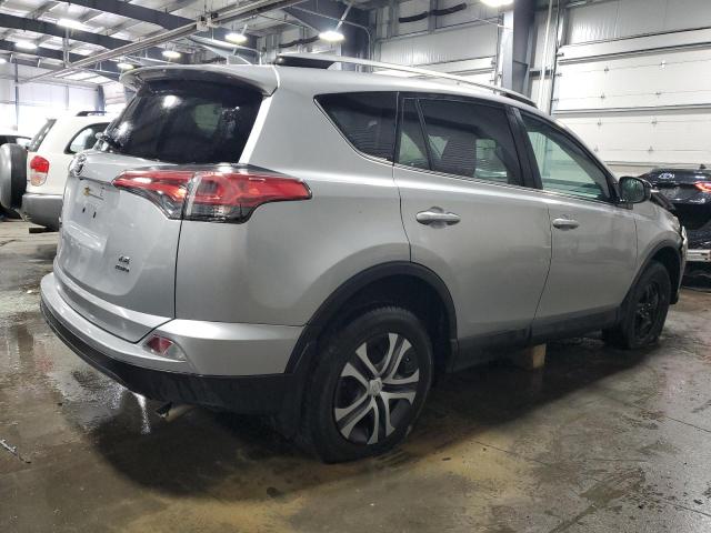 Photo 3 from auction – 2018 TOYOTA RAV4 LE with VIN 2T3BFREV2JW713432