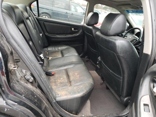 Photo 10 from auction – 2003 NISSAN MAXIMA GLE with VIN JN1DA31A73T437121