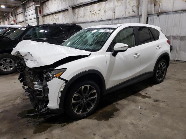MAZDA CX-5 GRAND 2016 with VIN JM3KE4DY5G0675586 - Photo from auction