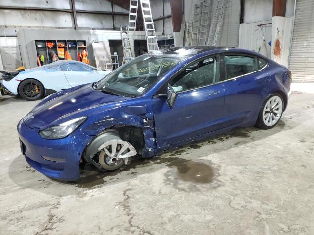 TESLA MODEL 3 2022 with VIN 5YJ3E1EAXNF285563 - Photo from auction