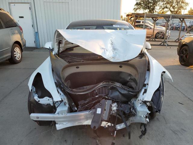 Photo 5 from auction – 2023 TESLA MODEL 3 with VIN 5YJ3E1EA3PF458228