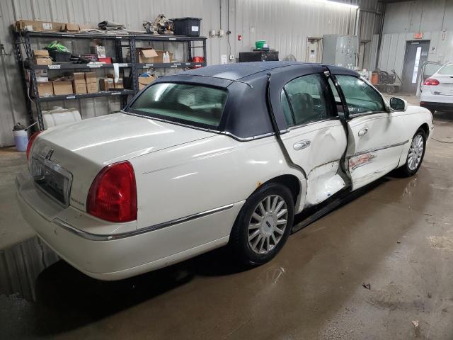 Photo 3 from auction – 2003 LINCOLN TOWN CAR E with VIN 1LNHM81W33Y673004