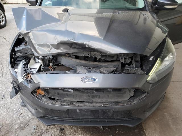 Photo 11 from auction – 2015 FORD FOCUS SE with VIN 1FADP3F23FL239188