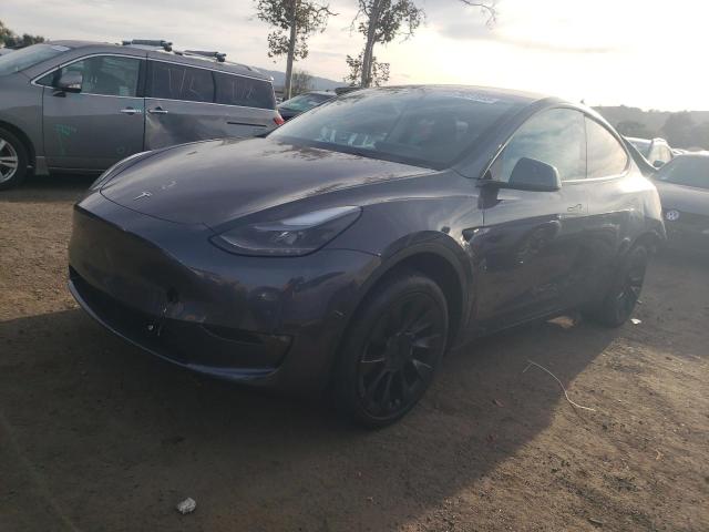 TESLA MODEL Y 2023 with VIN 7SAYGAEE0PF889051 - Photo from auction