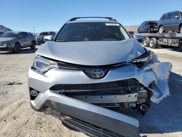 Photo 5 from auction – 2018 TOYOTA RAV4 LIMIT with VIN JTMYFREV1JJ185441