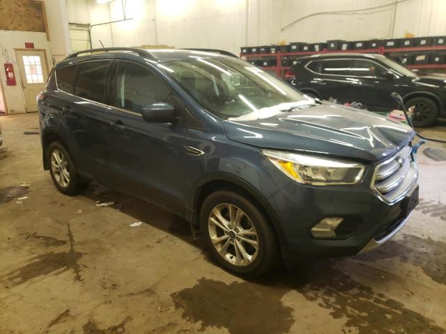 Photo 4 from auction – 2018 FORD ESCAPE SE with VIN 1FMCU9GD9JUB43971