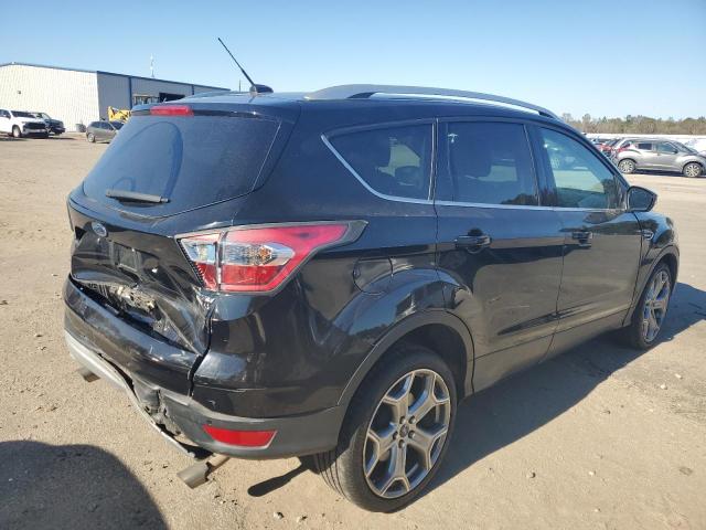 Photo 3 from auction – 2017 FORD ESCAPE TIT with VIN 1FMCU0J90HUA04578