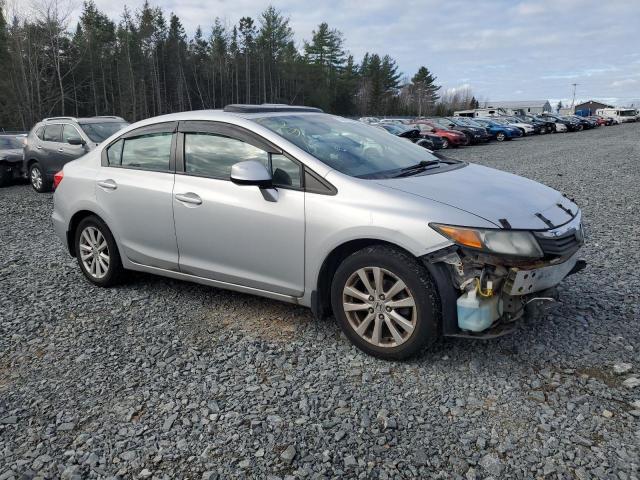 Photo 4 from auction – 2012 HONDA CIVIC LX with VIN 2HGFB2F51CH017443