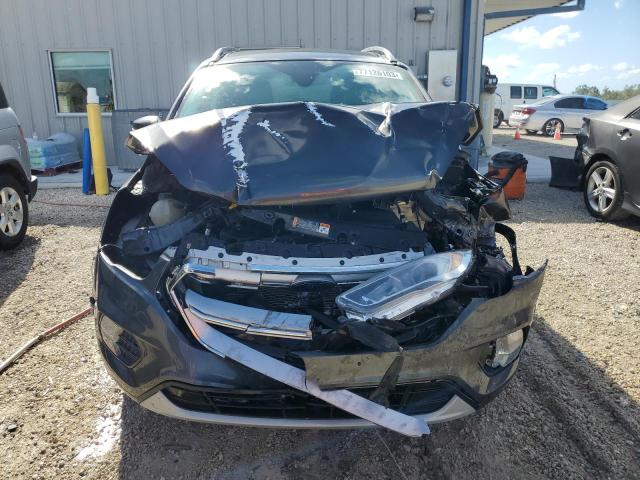 Photo 5 from auction – 2017 FORD ESCAPE TIT with VIN 1FMCU9JD4HUD74893