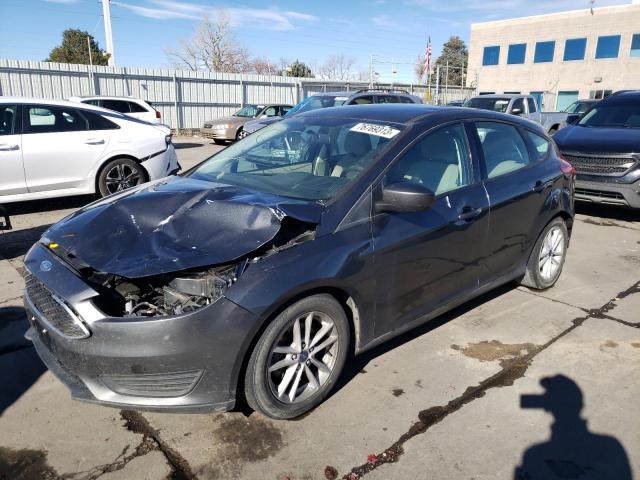 FORD FOCUS SE 2018 with VIN 1FADP3K2XJL213072 - Photo from auction