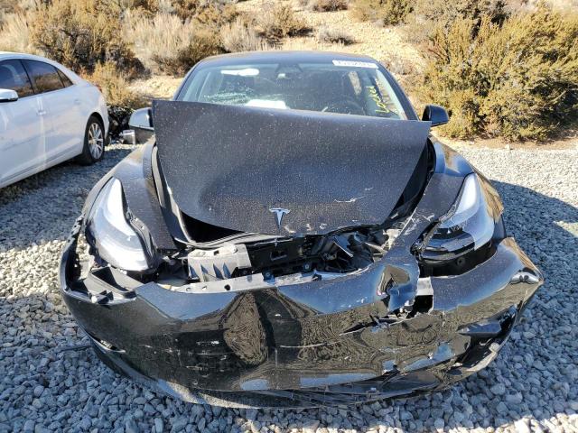 Photo 5 from auction – 2022 TESLA MODEL 3 with VIN 5YJ3E1EB1NF123409