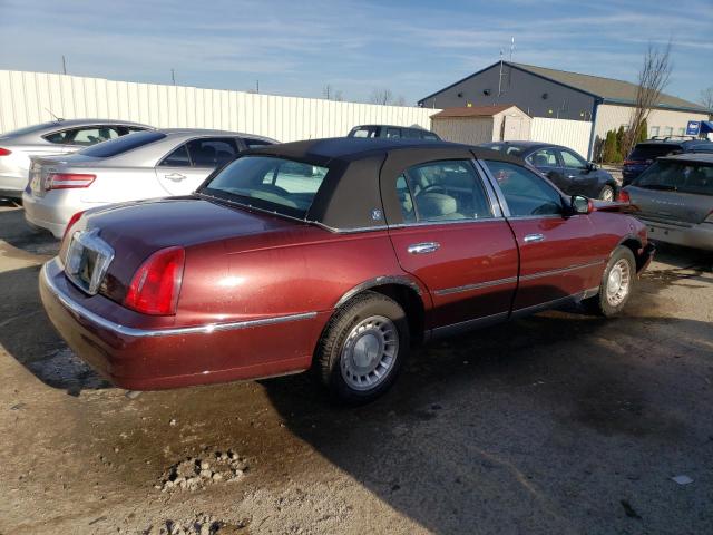 Photo 3 from auction – 2000 LINCOLN TOWN CAR E with VIN 1LNHM81W1YY769611