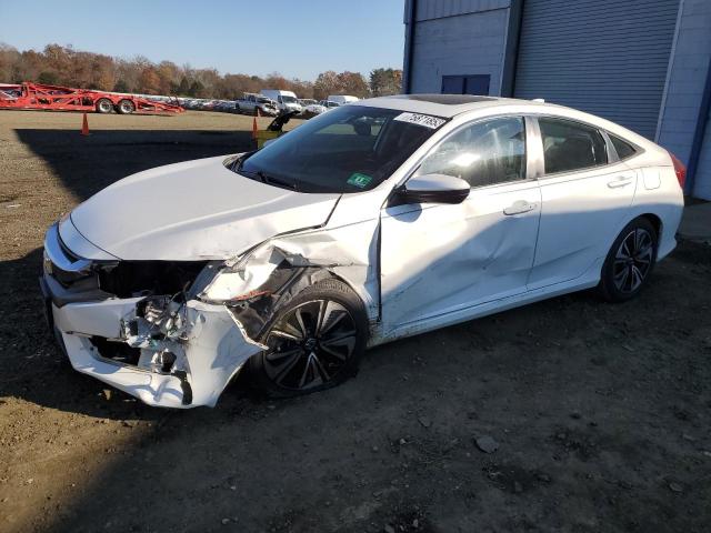 HONDA CIVIC EXL 2017 with VIN 2HGFC1F77HH646124 - Photo from auction