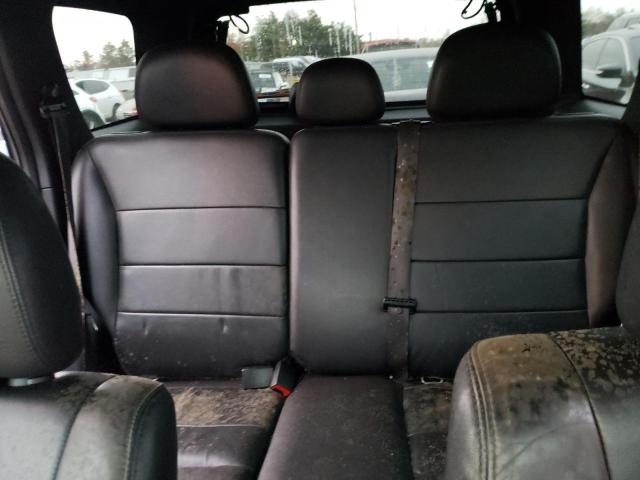 Photo 10 from auction – 2011 FORD ESCAPE LIM with VIN 1FMCU9EG5BKA40914
