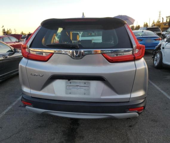 Photo 6 from auction – 2017 HONDA CR-V LX with VIN 7FARW5H30HE010109