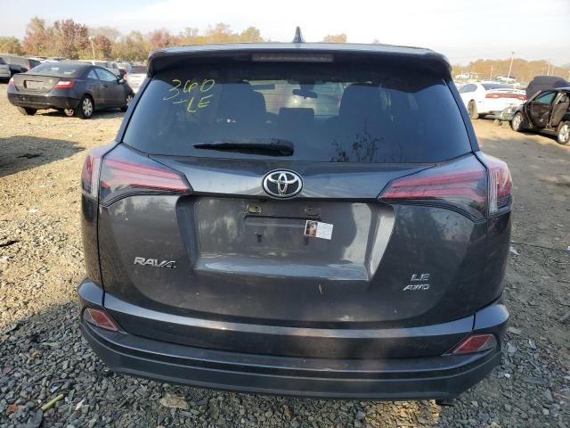 Photo 6 from auction – 2018 TOYOTA RAV4 LE with VIN JTMBFREV3JJ215495