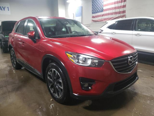 Photo 4 from auction – 2016 MAZDA CX-5 GT with VIN JM3KE4DY2G0853633