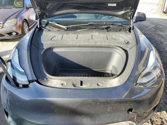 Photo 11 from auction – 2022 TESLA MODEL Y with VIN 7SAYGDEE4NA006564