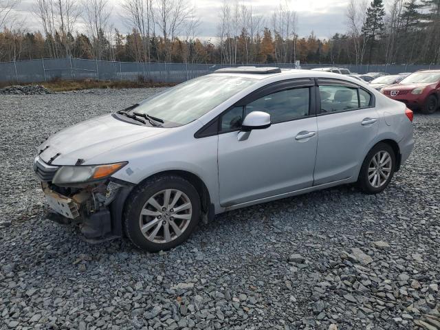 HONDA CIVIC LX 2012 with VIN 2HGFB2F51CH017443 - Photo from auction