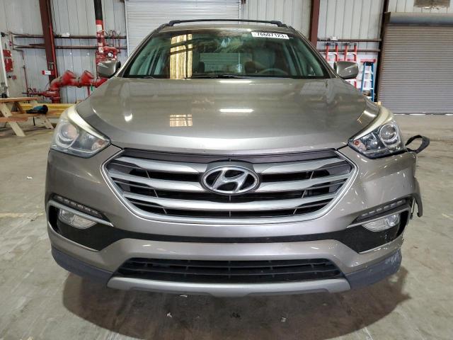 Photo 5 from auction – 2017 HYUNDAI SANTA FE S with VIN 5NMZU3LBXHH047882