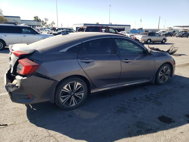 Photo 3 from auction – 2016 HONDA CIVIC EXL with VIN 19XFC1F79GE028599