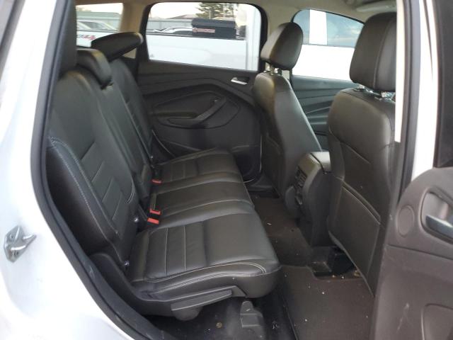 Photo 11 from auction – 2016 FORD ESCAPE TIT with VIN 1FMCU9J97GUB02669