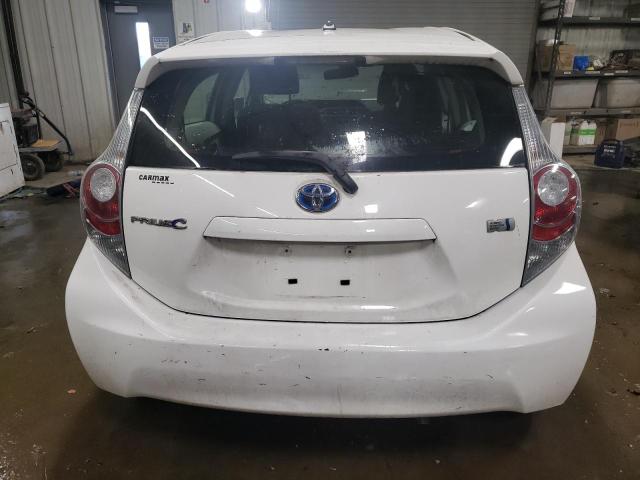 Photo 6 from auction – 2014 TOYOTA PRIUS C with VIN JTDKDTB3XE1072590