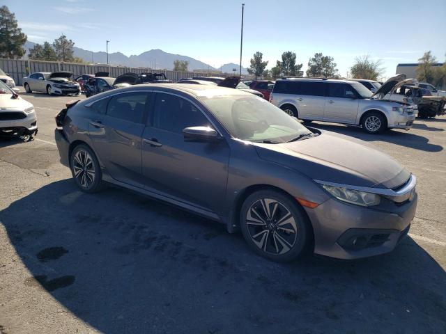 Photo 4 from auction – 2016 HONDA CIVIC EXL with VIN 19XFC1F79GE028599