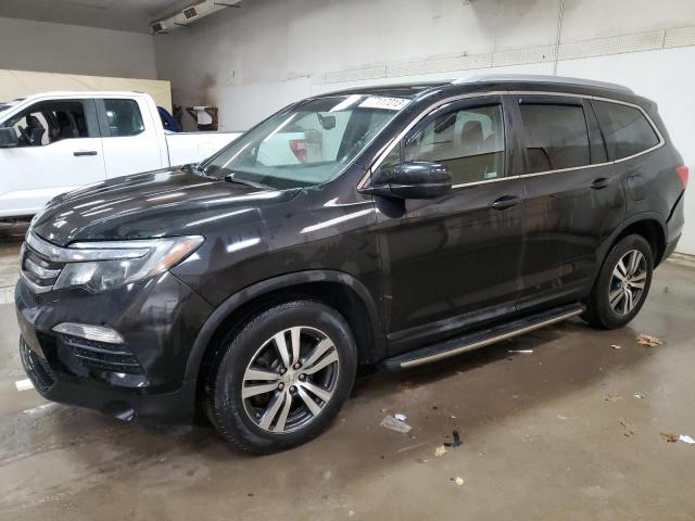 HONDA PILOT EXL 2018 with VIN 5FNYF6H52JB051135 - Photo from auction
