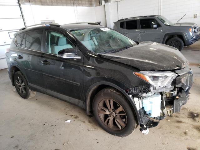 Photo 4 from auction – 2016 TOYOTA RAV4 XLE with VIN 2T3RFREV3GW426656