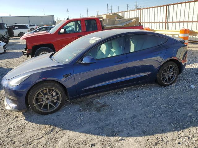 TESLA MODEL 3 2023 with VIN 5YJ3E1EA3PF514491 - Photo from auction