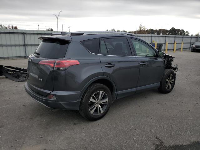 Photo 3 from auction – 2017 TOYOTA RAV4 XLE with VIN JTMWFREVXHD094314