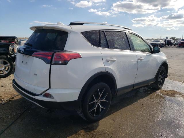 Photo 3 from auction – 2018 TOYOTA RAV4 SE with VIN JTMNFREVXJD125577