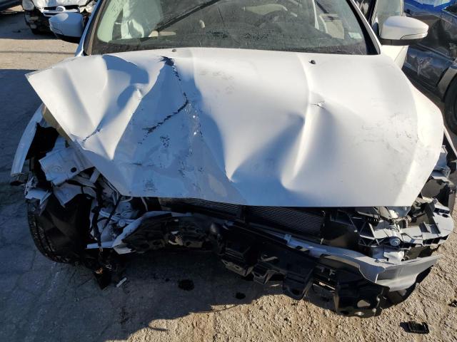 Photo 11 from auction – 2016 FORD FOCUS SE with VIN 1FADP3F24GL230050
