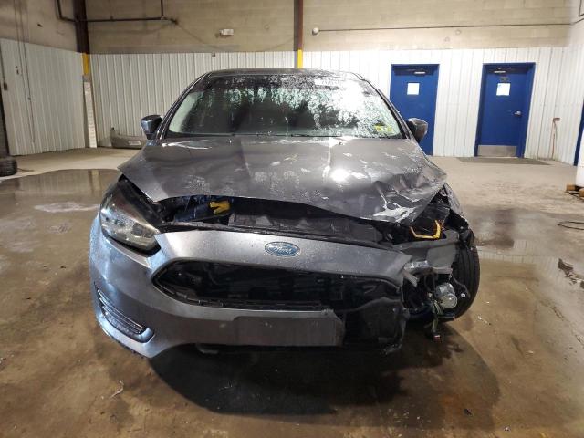 Photo 5 from auction – 2015 FORD FOCUS SE with VIN 1FADP3K2XFL223057