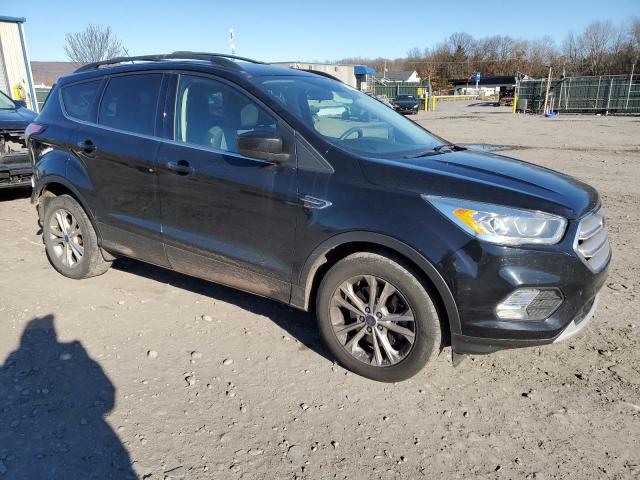 Photo 4 from auction – 2017 FORD ESCAPE SE with VIN 1FMCU9GD8HUC58152