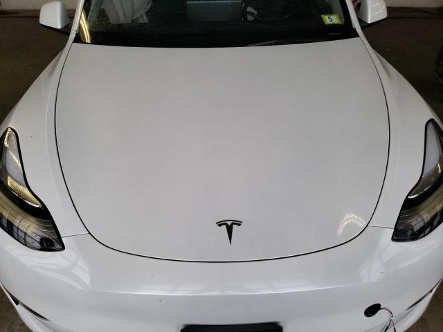 Photo 11 from auction – 2023 TESLA MODEL Y with VIN 7SAYGDEE9PA114858