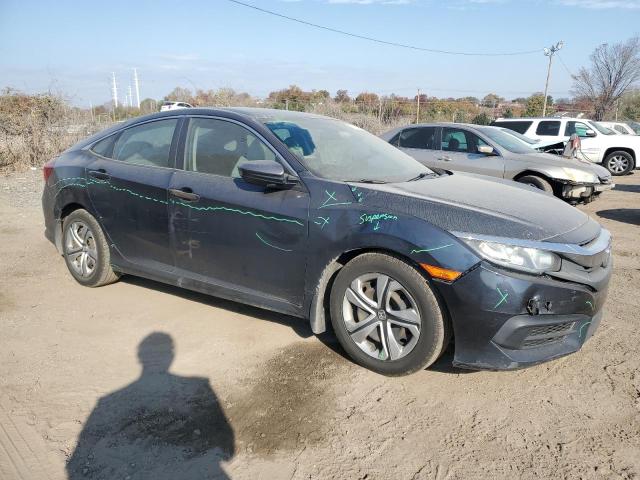 Photo 4 from auction – 2017 HONDA CIVIC LX with VIN 2HGFC2E50HH501593