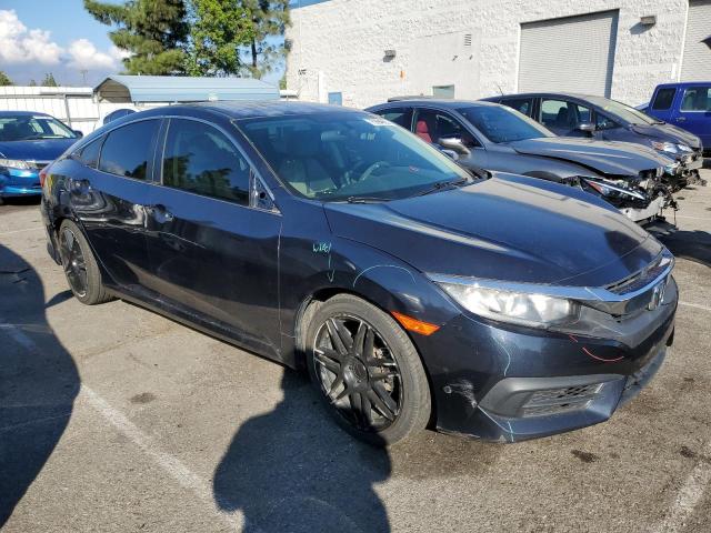 Photo 4 from auction – 2017 HONDA CIVIC LX with VIN 2HGFC2F54HH530495
