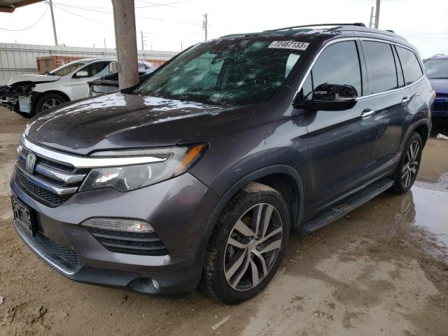 HONDA PILOT ELIT 2016 with VIN 5FNYF6H05GB053118 - Photo from auction